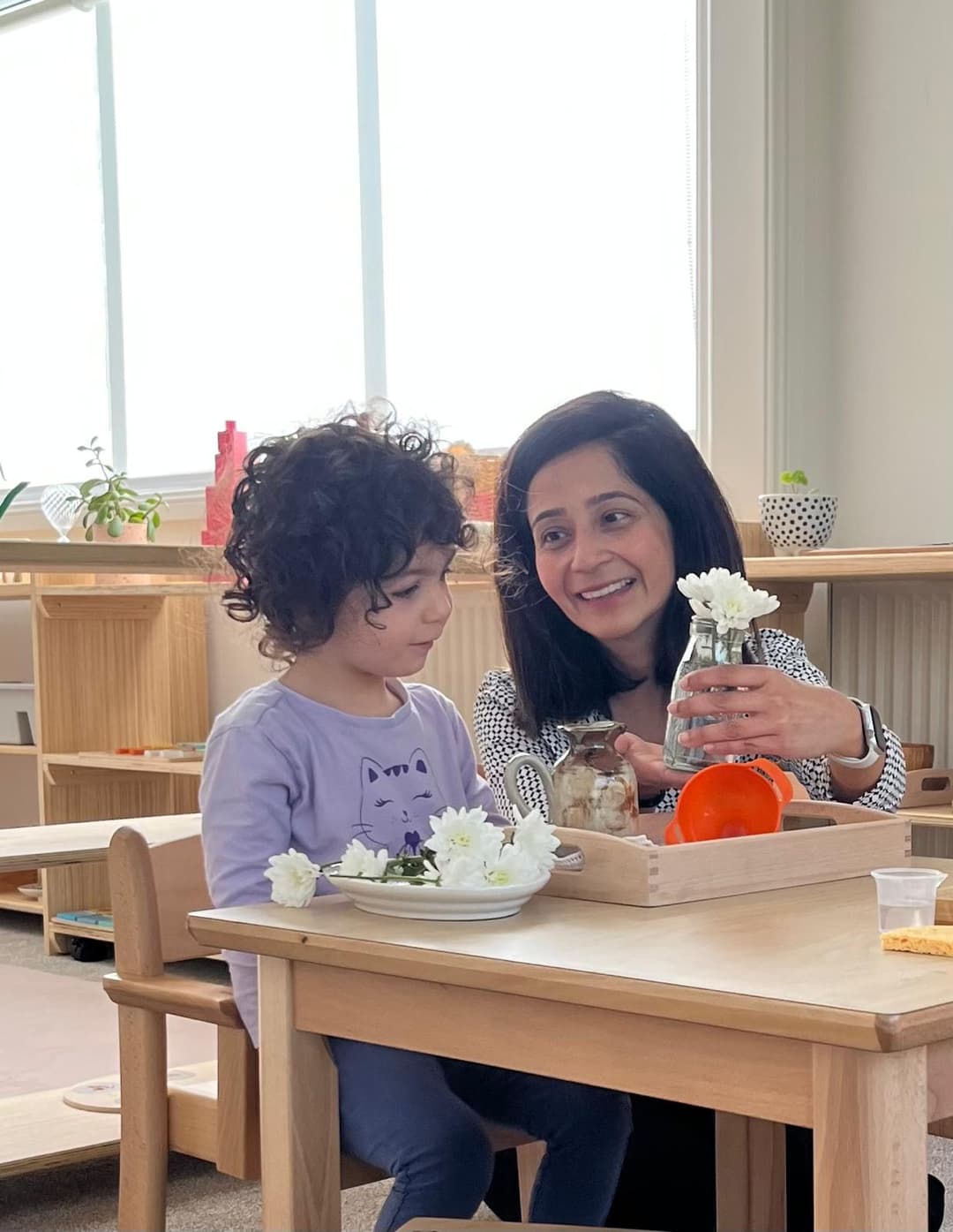 Parent and child doing flower arranging activity together