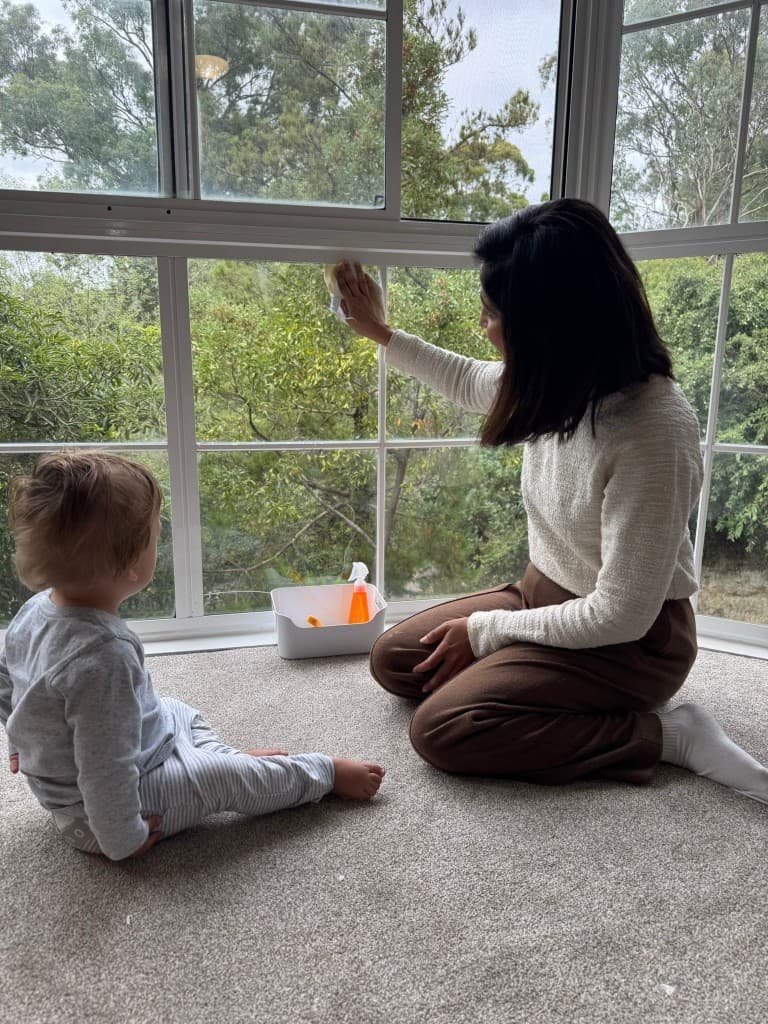 Practical life — window cleaning with educator